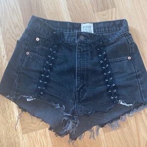 Lace up black jean shorts. Adjustable to many sizes